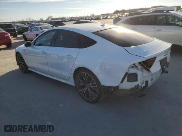 2016 Audi A7 3.0 Prestige with VIN WAU2GAFC8GN005520, listed as a Copart auction lot 42565444 with 102,805 mi miles. Bid and sale history available at carsss.com. Image 2.