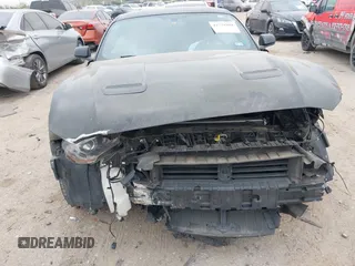 2020 Ford Mustang EcoBoost with VIN 1FA6P8TH3L5105814, listed as a IAAI auction lot 41778304 with 63,771 mi miles. Bid and sale history available at carsss.com. Image 12.