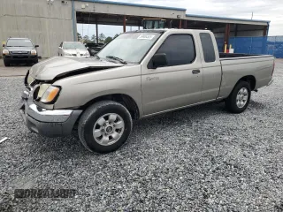 2000 Nissan Frontier XE z VIN 1N6DD26S6YC415423, wystawiony jako Copart lot #59086535 z przebiegiem 122 746 mil mil oraz Szkoda całkowita • Salvage title. Historia ofert i sprzedaży dostępna na DreamBid. Obrazek 1.
