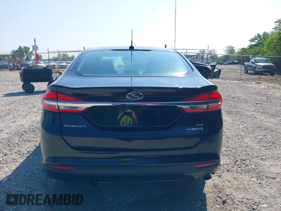 2017 Ford Fusion Hybrid SE with VIN 3FA6P0LU5HR344879, listed as a IAAI auction lot 42483771 with 146,603 mi miles and . Bid and sale history available at DreamBid. Image 17.