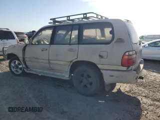 2001 Toyota Land Cruiser with VIN JTEHT05J012006393, listed as a Copart auction lot 50062695 with 319,586 mi miles and Clean Title. Bid and sale history available at carsss.com. Image 2.