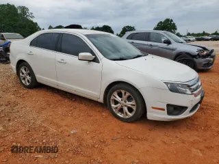 2012 Ford Fusion SE z VIN 3FAHP0HAXCR132060, wystawiony jako Copart lot #56148395 z przebiegiem 172 160 mil mil oraz Czysty tytuł • Clean title. Historia ofert i sprzedaży dostępna na DreamBid. Obrazek 4.