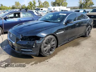 2013 Jaguar XJ Supercharged with VIN SAJWA2GE3DMV42875, listed as a Copart auction lot 71409324 with 129,422 mi miles and Salvage title. Bid and sale history available at DreamBid. Image 1.