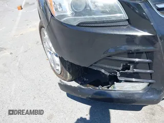 2015 Ford Escape Titanium с VIN 1FMCU0JX5FUB87813, выставлен на аукционе IAAI как лот 42035295 с пробегом 148 430 миль миль и . История ставок и продаж доступна на DreamBid. Изображение 6.