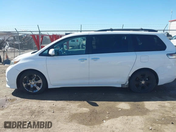 2014 Toyota Sienna SE with VIN 5TDXK3DC0ES477207, listed as a IAAI auction lot 41624619 with 213,881 mi miles and . Bid and sale history available at DreamBid. Image 14.