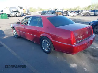 2006 Cadillac DTS 1SC z VIN 1G6KD57Y36U203703, wystawiony jako IAAI lot #42083564 z przebiegiem 183 549 mil mil oraz . Historia ofert i sprzedaży dostępna na DreamBid. Obrazek 3.