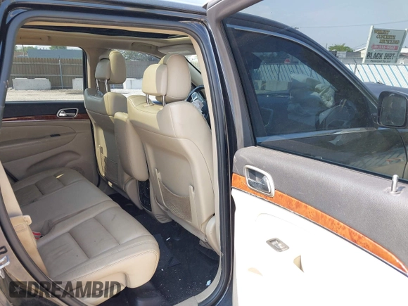 2011 Jeep Grand Cherokee Limited with VIN 1J4RR5GG9BC619477, listed as a IAAI auction lot 42457460 with 171,856 mi miles and . Bid and sale history available at DreamBid. Image 8.