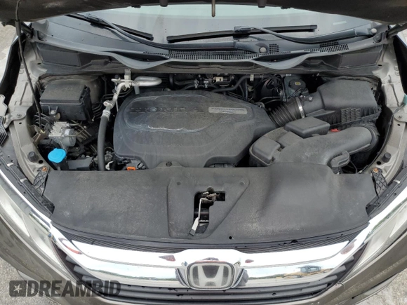 2018 Honda Odyssey EX with VIN 5FNRL6H5XJB017330, listed as a Copart auction lot 63470395 with 121,827 mi miles and Salvage title. Bid and sale history available at DreamBid. Image 12.