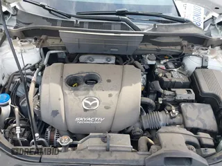 2018 Mazda CX-5 Grand Touring with VIN JM3KFADMXJ0470846, listed as a IAAI auction lot 41913533 with 54,700 mi miles and . Bid and sale history available at DreamBid. Image 10.