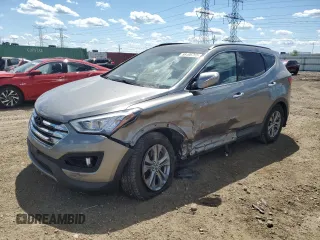 2014 Hyundai Santa Fe with VIN 5XYZU3LB0EG138598, listed as a Copart auction lot 58196765 with 61,099 mi miles and Salvage title. Bid and sale history available at DreamBid. Image 1.