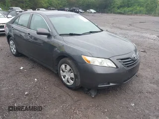 2007 Toyota Camry CE with VIN 4T1BE46K77U129152, listed as a IAAI auction lot 42107149 with 203,722 mi miles and . Bid and sale history available at DreamBid. Image 1.