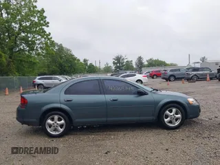 2005 Dodge Stratus SXT z VIN 1B3EL46X15N679491, wystawiony jako IAAI lot #42265145 z przebiegiem 147 463 mil mil oraz . Historia ofert i sprzedaży dostępna na DreamBid. Obrazek 13.