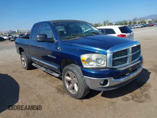 2007 Dodge 1500 SLT with VIN 1D7HU18207J606248, listed as a IAAI auction lot 42141047 with 128,821 mi miles. Bid and sale history available at carsss.com. Image 1.