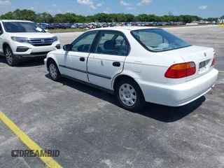 2000 Honda Civic LX z VIN 1HGEJ6679YL019958, wystawiony jako IAAI lot #42328269 z przebiegiem 217 961 mil mil oraz . Historia ofert i sprzedaży dostępna na DreamBid. Obrazek 3.