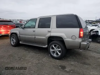 2000 Cadillac Escalade z VIN 1GYEK63R5YR219759, wystawiony jako Copart lot #86373734 z przebiegiem 190 307 mil mil oraz Szkoda całkowita • Salvage title. Historia ofert i sprzedaży dostępna na DreamBid. Obrazek 2.