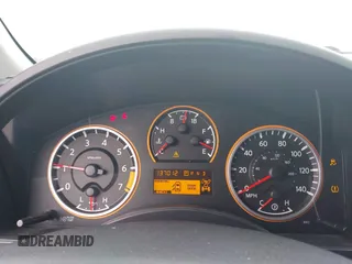 2014 Nissan Titan Pro-4X with VIN 1N6BA0EC1EN515685, listed as a IAAI auction lot 42423258 with 137,012 mi miles and . Bid and sale history available at DreamBid. Image 7.