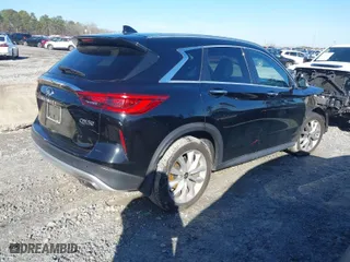 2021 Infiniti QX50 LUXE with VIN 3PCAJ5BA5MF114975, listed as a IAAI auction lot 41479978 with 57,368 mi miles. Bid and sale history available at carsss.com. Image 4.