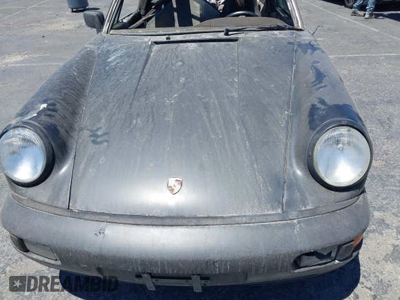 1988 Porsche 911 z VIN WP0EB0917JS161351, wystawiony jako IAAI lot #39908257 z przebiegiem Nie podano mil oraz . Historia ofert i sprzedaży dostępna na DreamBid. Obrazek 10.
