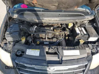 2006 Chrysler Town & Country Touring with VIN 2A8GP54L66R876008, listed as a IAAI auction lot 42496347 with 211,063 mi miles and . Bid and sale history available at DreamBid. Image 10.