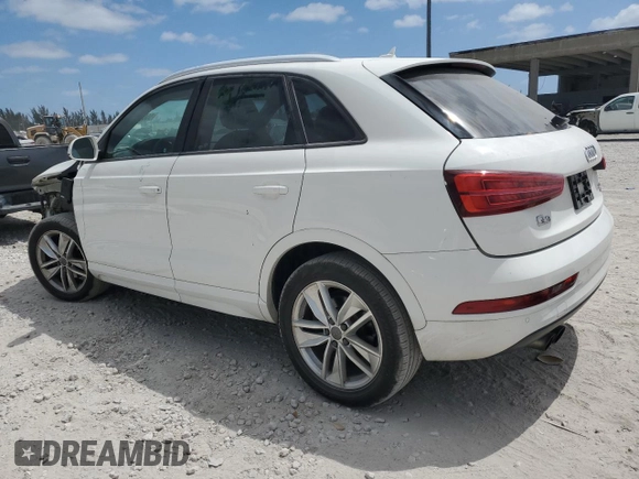 2018 Audi Q3 Premium with VIN WA1ECCFS1JR034690, listed as a Copart auction lot 55047735 with 73,488 mi miles and Salvage title. Bid and sale history available at DreamBid. Image 2.