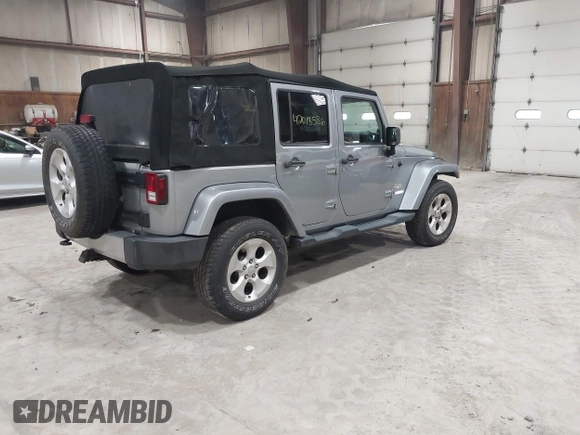 2014 Jeep Wrangler Unlimited Sahara with VIN 1C4BJWEG5EL164350, listed as a IAAI auction lot 42018586 with 113,222 mi miles. Bid and sale history available at carsss.com. Image 4.