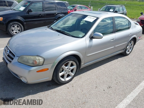 2003 Nissan Maxima SE with VIN JN1DA31D33T513282, listed as a IAAI auction lot 42289710 with 343,973 mi miles and . Bid and sale history available at DreamBid. Image 2.