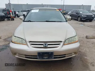 2001 Honda Accord EX z VIN 1HGCG165X1A077702, wystawiony jako IAAI lot #41770556 z przebiegiem 149 516 mil mil oraz . Historia ofert i sprzedaży dostępna na DreamBid. Obrazek 12.