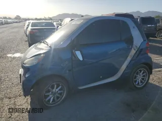 2009 Smart fortwo Pure z VIN WMEEJ31X39K273968, wystawiony jako Copart lot #56888045 z przebiegiem 125 138 mil mil oraz Szkody całkowita. Historia ofert i sprzedaży dostępna na DreamBid. Obrazek 1.