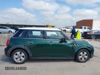 2016 MINI Hardtop 4 Door with VIN WMWXU1C52G2D10035, listed as a IAAI auction lot 42190544 with 106,383 mi miles and . Bid and sale history available at DreamBid. Image 13.