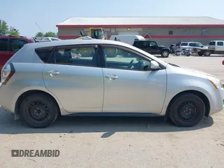 2009 Pontiac Vibe z VIN 5Y2SM67059Z447387, wystawiony jako IAAI lot #42404255 z przebiegiem 181 295 mil mil oraz . Historia ofert i sprzedaży dostępna na DreamBid. Obrazek 14.