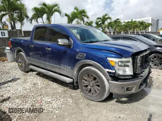 2017 Nissan Titan SL with VIN 1N6AA1E6XHN536129, listed as a Copart auction lot 60496415 with 132,269 mi miles and Salvage title. Bid and sale history available at DreamBid. Image 4.