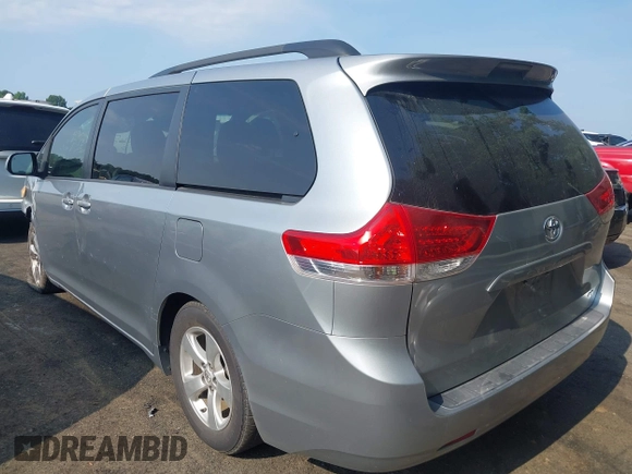 2013 Toyota Sienna LE AAS with VIN 5TDKK3DC2DS389557, listed as a IAAI auction lot 42589108 with 205,115 mi miles and . Bid and sale history available at DreamBid. Image 3.