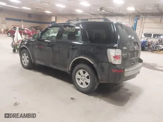2010 Mercury Mariner with VIN 4M2CN9BG0AKJ06493, listed as a IAAI auction lot 41199173 with 143,631 mi miles. Bid and sale history available at carsss.com. Image 3.