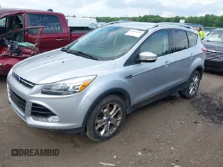 2016 Ford Escape Titanium with VIN 1FMCU9J95GUB93585, listed as a IAAI auction lot 42614106 with 124,465 mi miles and . Bid and sale history available at DreamBid. Image 17.
