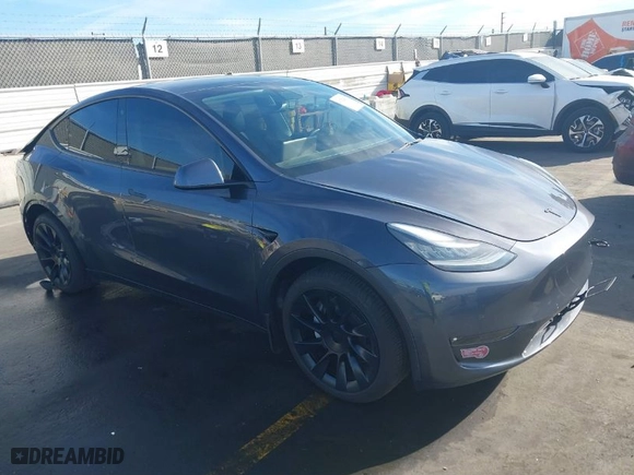 2021 Tesla Model Y Long Range with VIN 5YJYGDEE7MF149037, listed as a IAAI auction lot 41252869 with NaN miles. Bid and sale history available at carsss.com. Image 1.