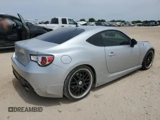 2013 Scion FR-S z VIN JF1ZNAA11D1704767, wystawiony jako Copart lot #52250275 z przebiegiem 82 246 mil mil oraz Czysty tytuł • Clean title. Historia ofert i sprzedaży dostępna na DreamBid. Obrazek 3.