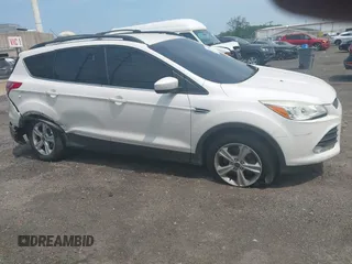 2013 Ford Escape SE z VIN 1FMCU9GXXDUD82847, wystawiony jako IAAI lot #42436360 z przebiegiem 142 071 mil mil oraz . Historia ofert i sprzedaży dostępna na DreamBid. Obrazek 12.