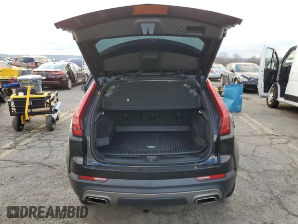 2021 Cadillac XT4 AWD Premium Luxury with VIN 1GYFZDR4XMF016846, listed as a Copart auction lot 82963704 with 44,063 mi miles and Salvage Title. Bid and sale history available at carsss.com. Image 6.