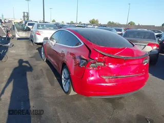 2018 Tesla Model 3 Long Range Battery with VIN 5YJ3E1EA3JF035785, listed as a IAAI auction lot 41986774 with 33,965 mi miles and . Bid and sale history available at DreamBid. Image 3.