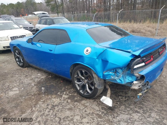 2015 Dodge Challenger R/T with VIN 2C3CDZAT6FH878216, listed as a IAAI auction lot 41304913 with 104,176 mi miles. Bid and sale history available at carsss.com. Image 3.