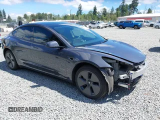 2023 Tesla Model 3 with VIN 5YJ3E1EA6PF650212, listed as a IAAI auction lot 42554747 with 49,838 mi miles and . Bid and sale history available at DreamBid. Image 1.