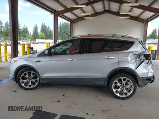 2013 Ford Escape Titanium с VIN 1FMCU9J98DUB24112, выставлен на аукционе IAAI как лот 42338121 с пробегом 162 786 миль миль и . История ставок и продаж доступна на DreamBid. Изображение 15.