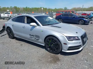 2014 Audi A7 Prestige with VIN WAU2GAFC3EN033481, listed as a IAAI auction lot 42094489 with 93,147 mi miles and . Bid and sale history available at DreamBid. Image 1.