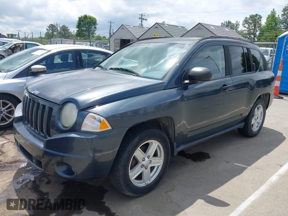 2007 Jeep Compass Sport with VIN 1J8FF47W17D597598, listed as a IAAI auction lot 42157027 with 153,043 mi miles and . Bid and sale history available at carsss.com. Image 2.