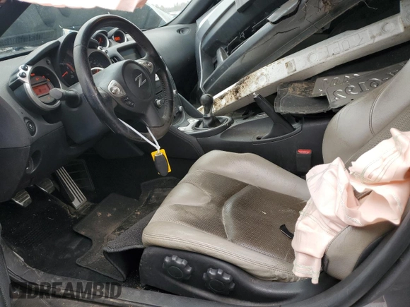 2012 Nissan 370Z с VIN JN1AZ4EH6CM562615, выставлен на аукционе Copart как лот 47623125 с пробегом 86 468 миль миль и Списание • Salvage title. История ставок и продаж доступна на DreamBid. Изображение 7.