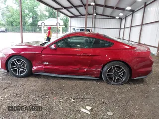 2018 Ford Mustang EcoBoost with VIN 1FA6P8TH7J5101309, listed as a IAAI auction lot 42211115 with 70,661 mi miles and . Bid and sale history available at DreamBid. Image 14.