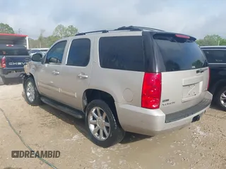 2009 GMC Yukon SLT w/4SB with VIN 1GKFC33029R273453, listed as a IAAI auction lot 41843277 with 194,684 mi miles. Bid and sale history available at carsss.com. Image 3.