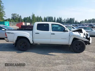 2015 Toyota Tacoma with VIN 3TMLU4EN5FM182720, listed as a IAAI auction lot 42555728 with 183,081 mi miles and . Bid and sale history available at DreamBid. Image 13.