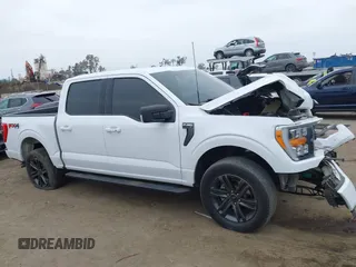 2022 Ford F-150 XL with VIN 1FTFW1E57NKE14424, listed as a IAAI auction lot 42097712 with 56,879 mi miles and . Bid and sale history available at DreamBid. Image 13.