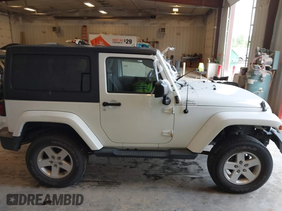 2015 Jeep Wrangler Sahara with VIN 1C4AJWBG7FL648621, listed as a IAAI auction lot 42439781 with 107,148 mi miles and . Bid and sale history available at DreamBid. Image 13.